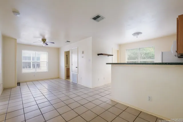 a view of an empty room and window