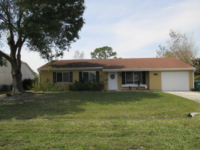 1690 Southeast Ridgewood Street Port St. Lucie, FL 34952 - Photo 1 of 20 Front