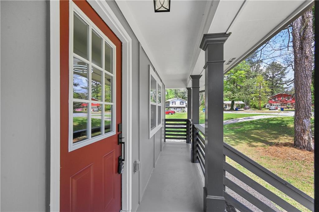 140 Buckhurst Way South Fulton, GA 30349 - Photo 2 of 45 a view of a balcony with wooden floor and outdoor space