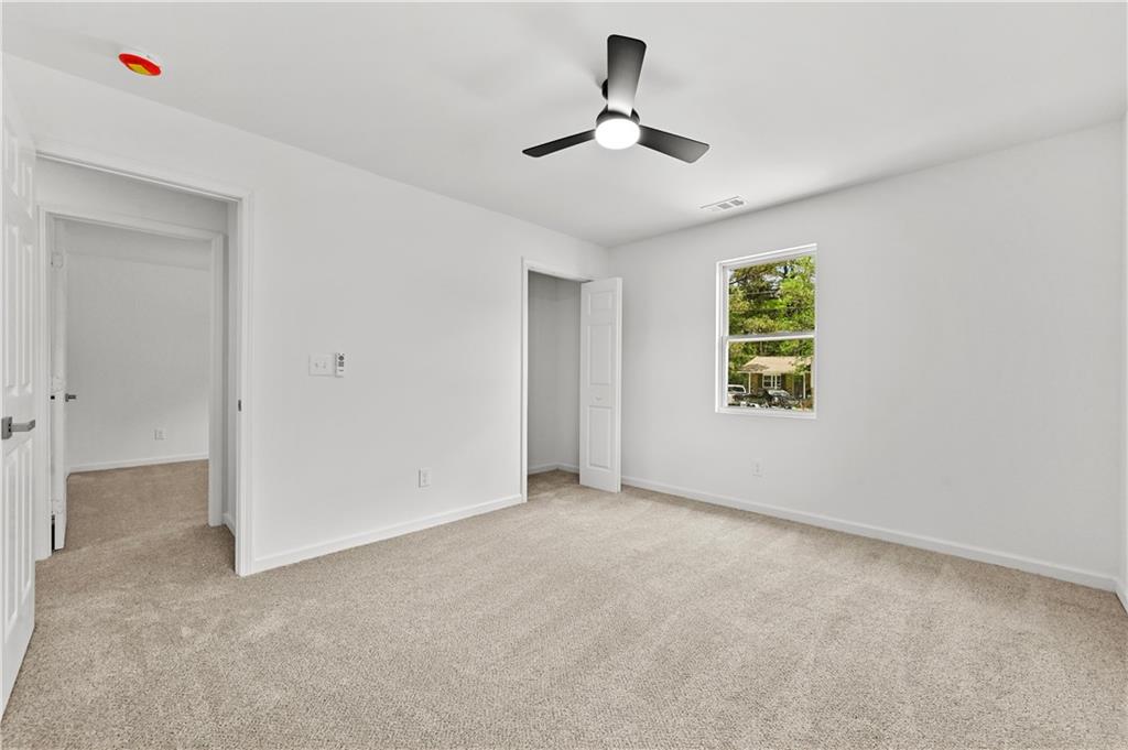 140 Buckhurst Way South Fulton, GA 30349 - Photo 22 of 45 a view of an empty room with a window