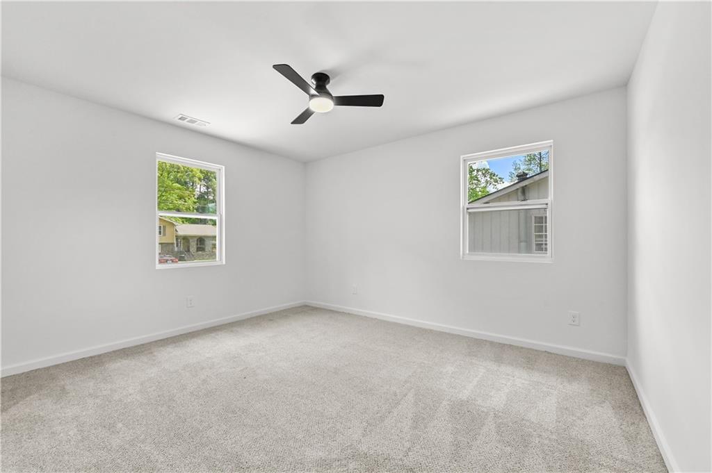 140 Buckhurst Way South Fulton, GA 30349 - Photo 23 of 45 a view of an empty room with a window