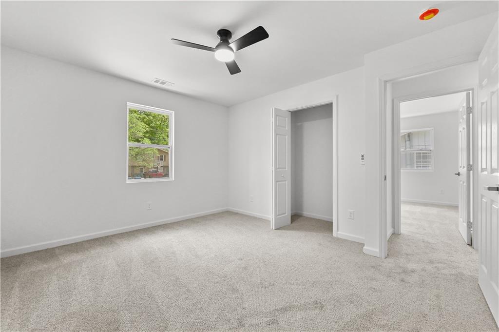 140 Buckhurst Way South Fulton, GA 30349 - Photo 24 of 45 a view of an empty room with a window