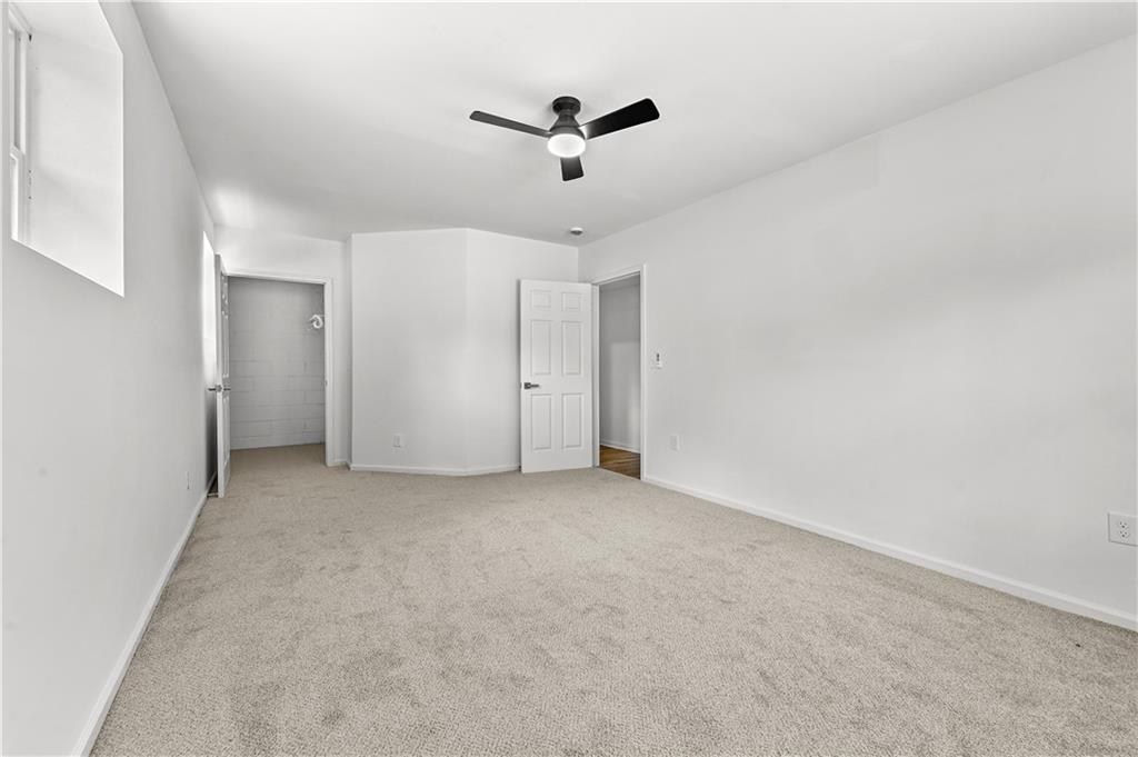 140 Buckhurst Way South Fulton, GA 30349 - Photo 30 of 45 a view of a livingroom with a ceiling fan