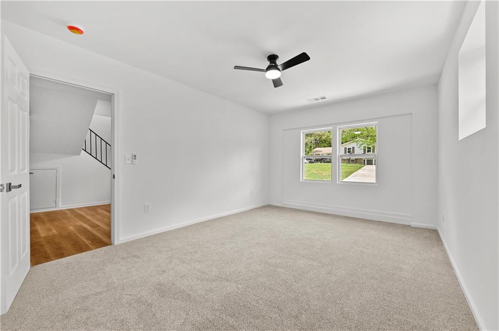 140 Buckhurst Way South Fulton, GA 30349 - Photo 31 of 45 a view of an empty room and a window