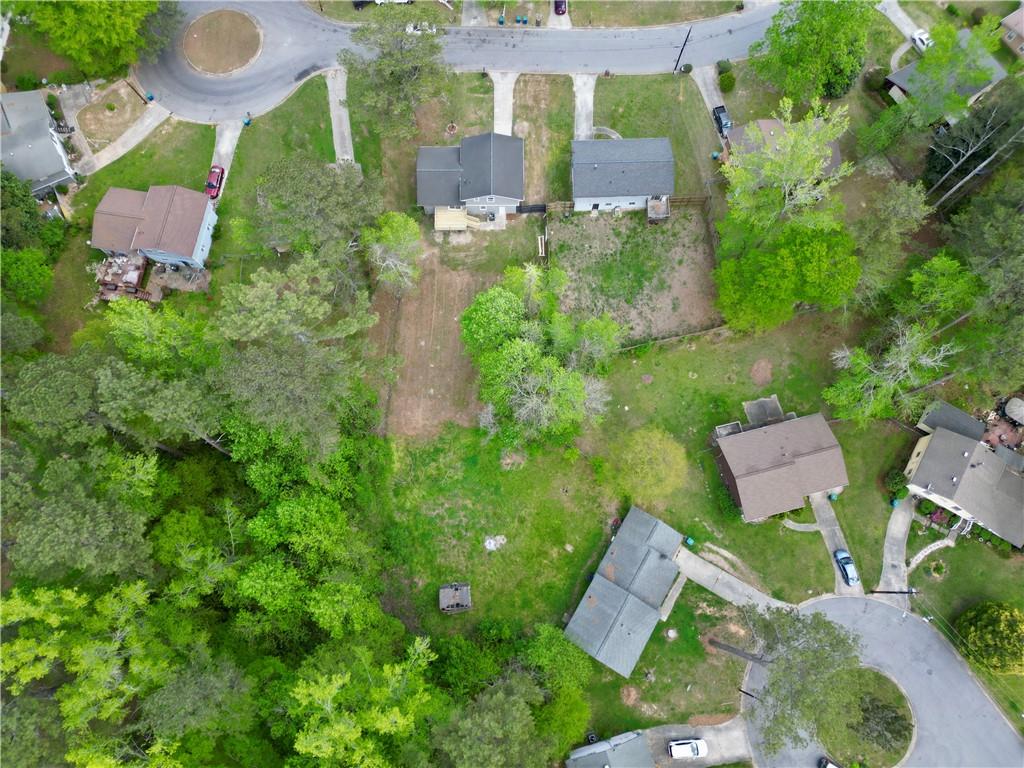 140 Buckhurst Way South Fulton, GA 30349 - Photo 43 of 45 an aerial view of a house with a yard and lake view
