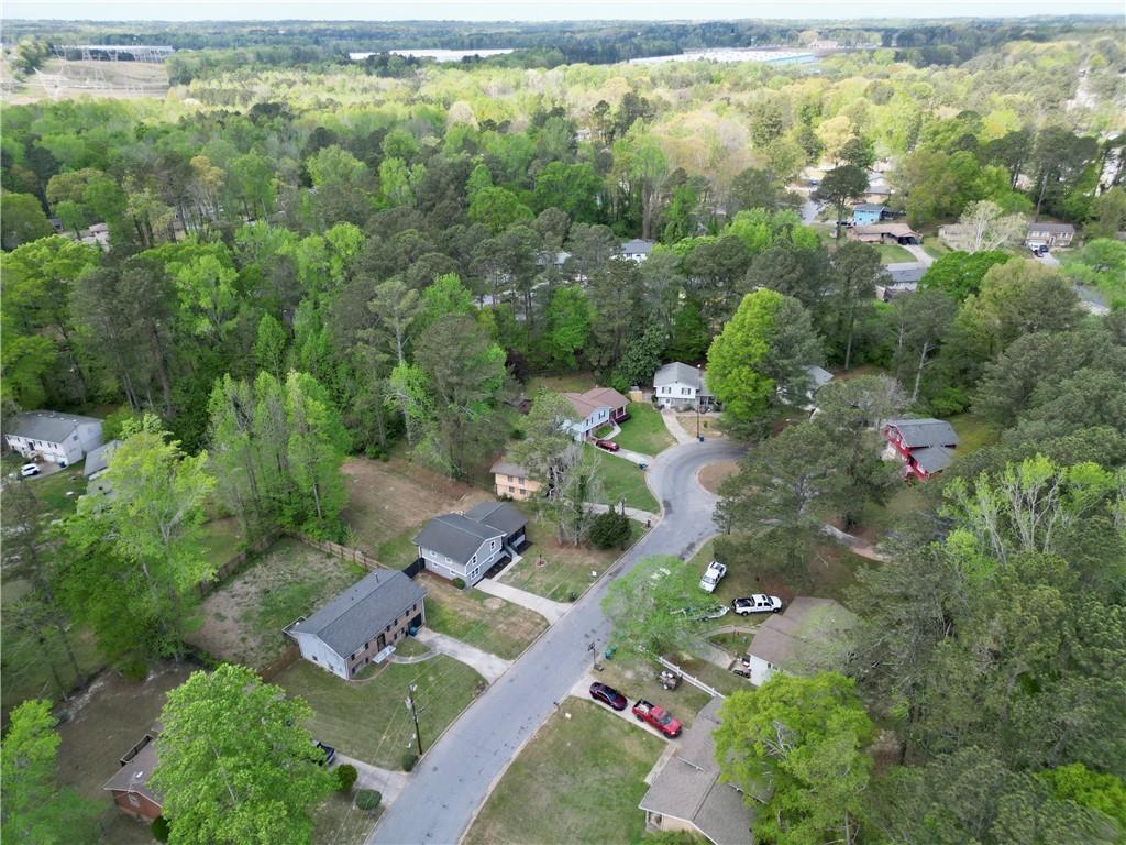 140 Buckhurst Way South Fulton, GA 30349 - Photo 45 of 45 an aerial view of residential houses with outdoor space and trees