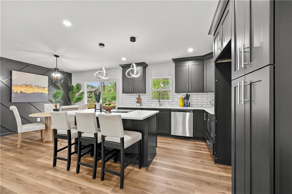 140 Buckhurst Way South Fulton, GA 30349 - Photo 10 of 45 a large kitchen with a table and chairs
