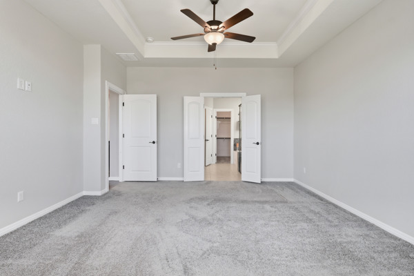 3604 Chaff Lane Pflugerville, TX 78660 - Photo 13 of 26 an empty room with closet and a ceiling fan