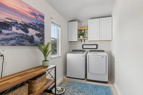 a view of kitchen with washer and dryer