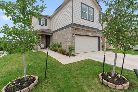 a house view with a garden space