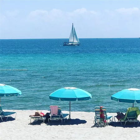 a view of a city with tall buildings