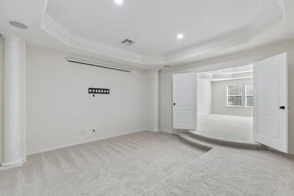 an empty room with windows