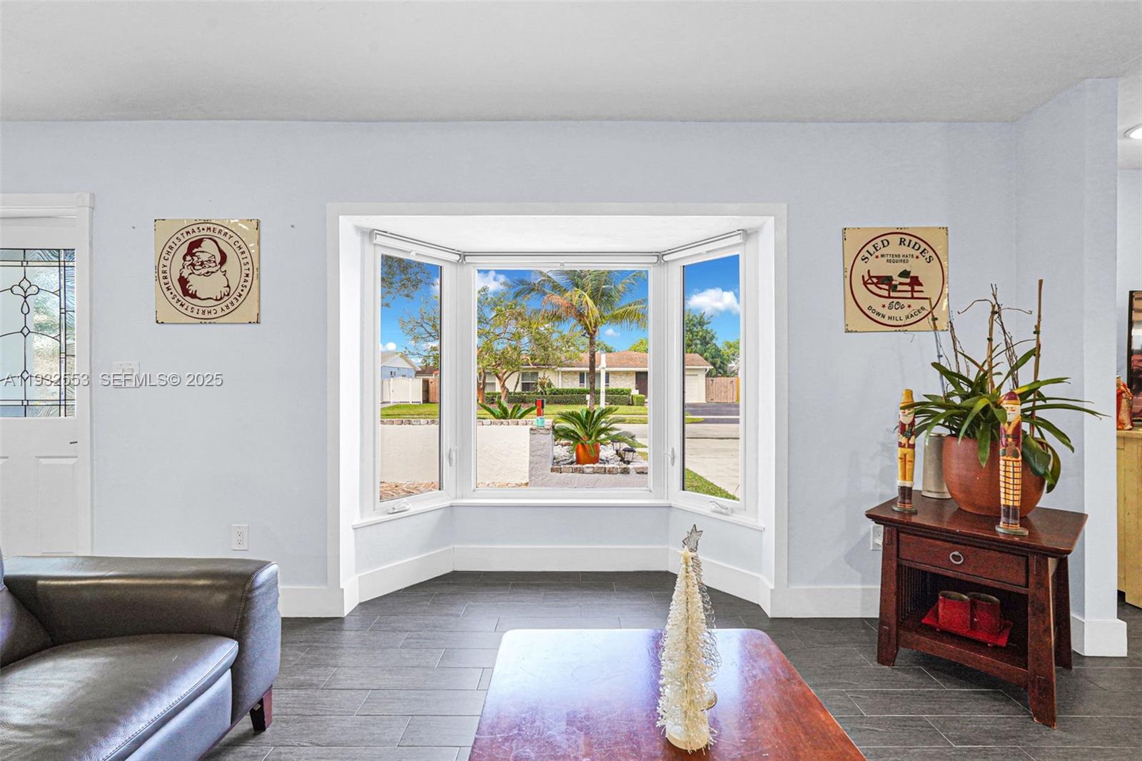 11561 Southwest 121st Avenue Miami, FL 33186 - Photo 20 of 30 a living room with furniture and a window