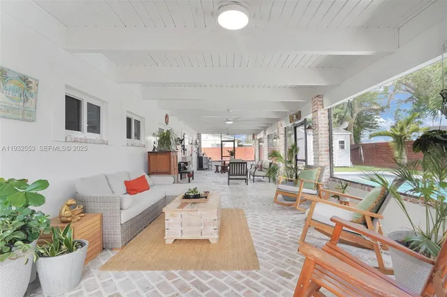 a view of a swimming pool with a lounge chairs