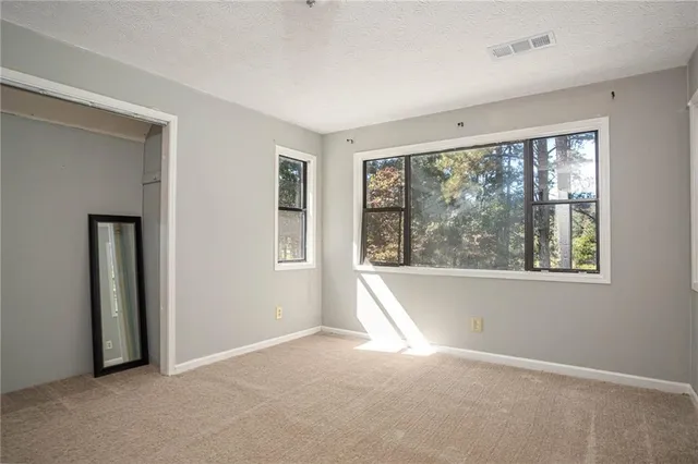 an empty room with windows