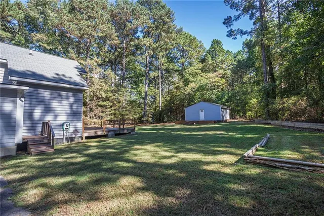 a view of a park with large trees