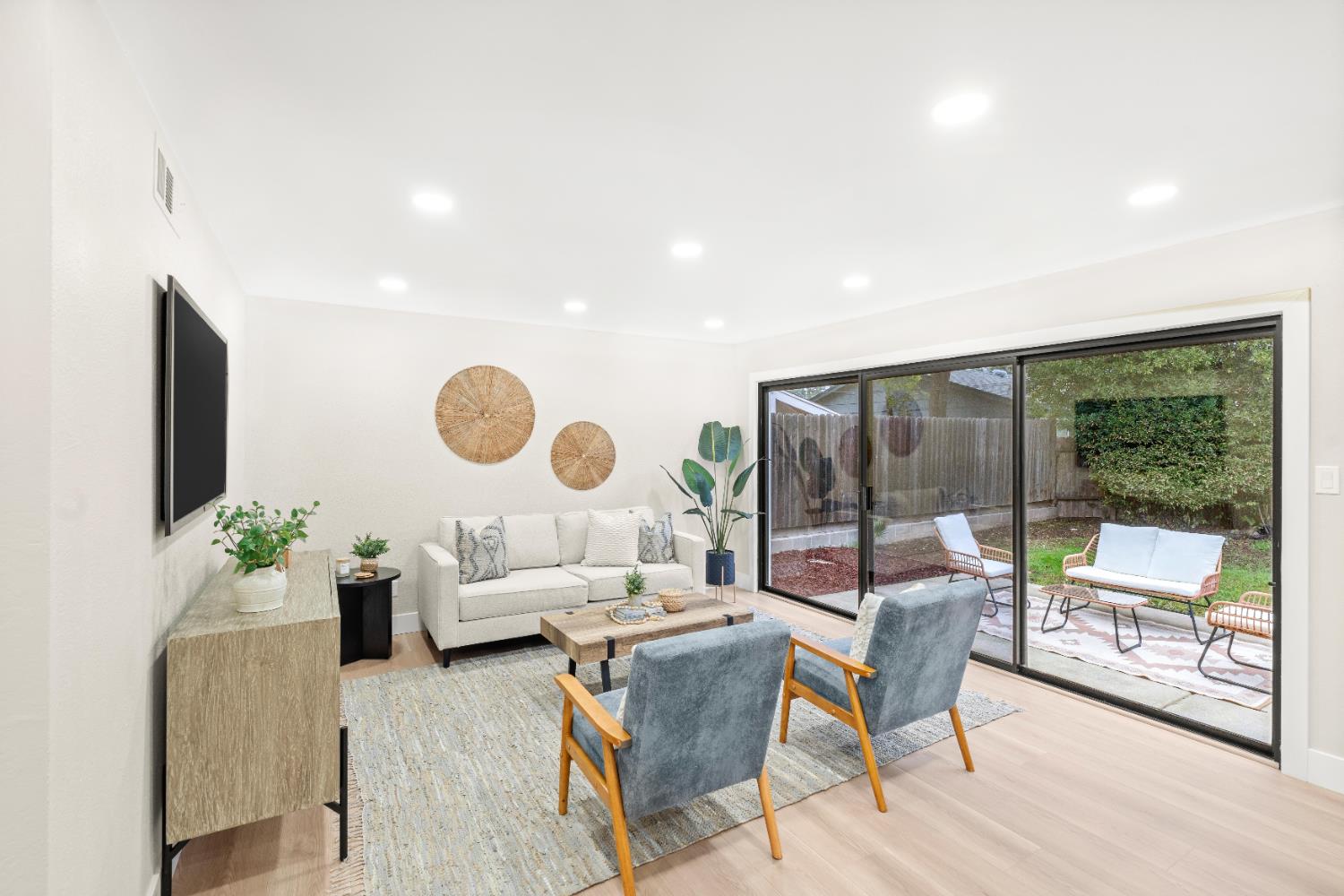 5610 Millburn Street Carmichael, CA 95608 - Photo 16 of 44 a living room with furniture and a large window