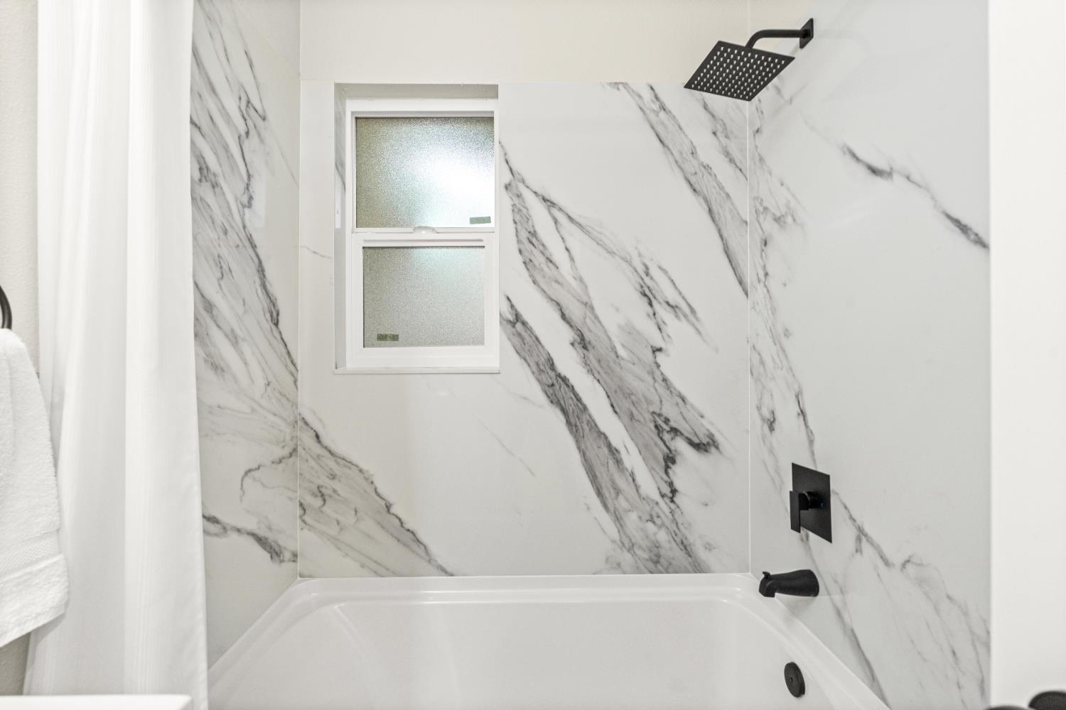 5610 Millburn Street Carmichael, CA 95608 - Photo 21 of 44 a view of staircase with white walls and a window