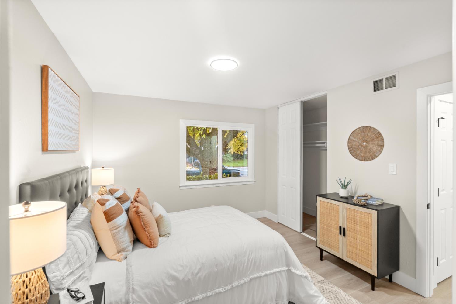 5610 Millburn Street Carmichael, CA 95608 - Photo 26 of 44 a bedroom with a bed and a window