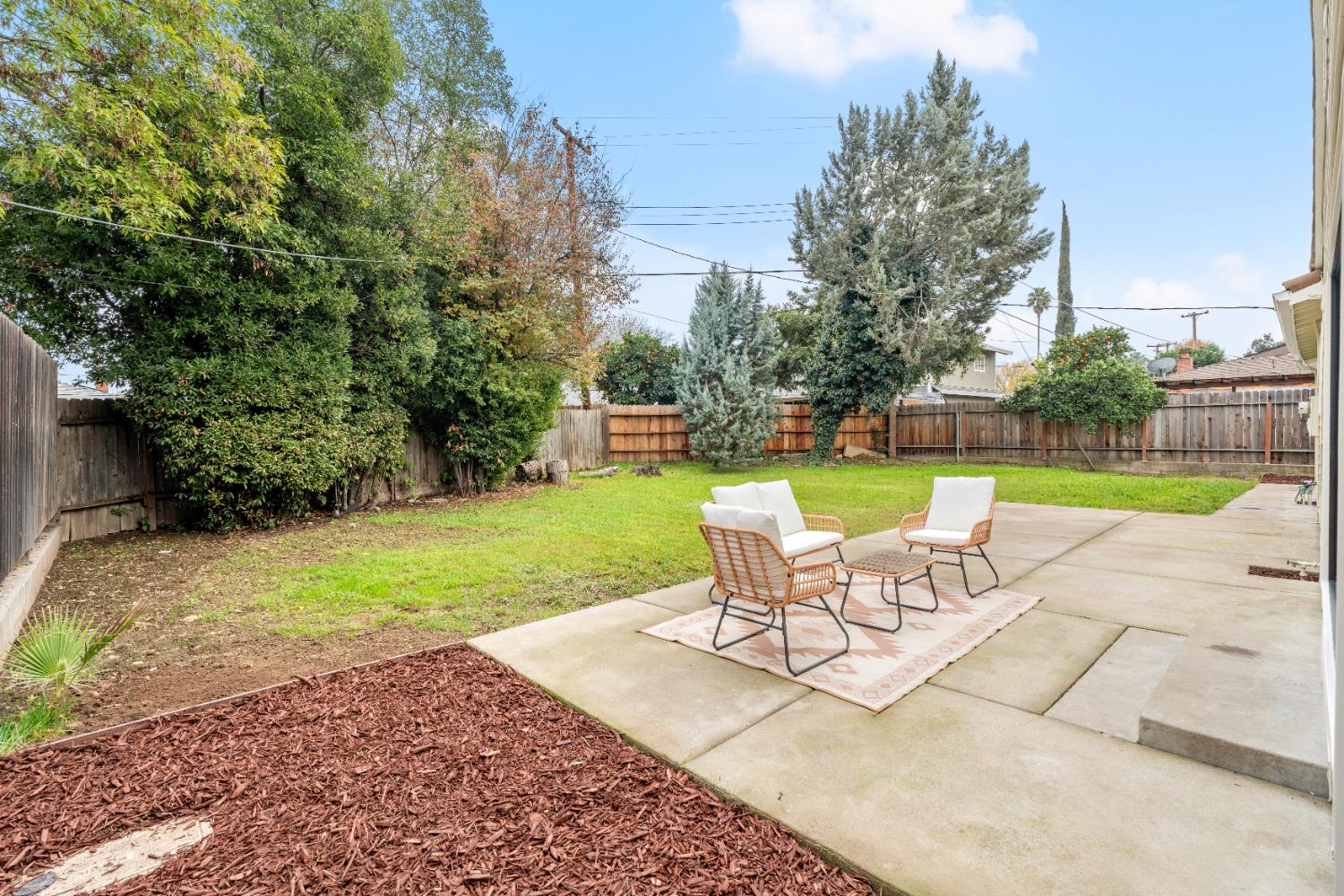 5610 Millburn Street Carmichael, CA 95608 - Photo 35 of 44 a view of a backyard with sitting area