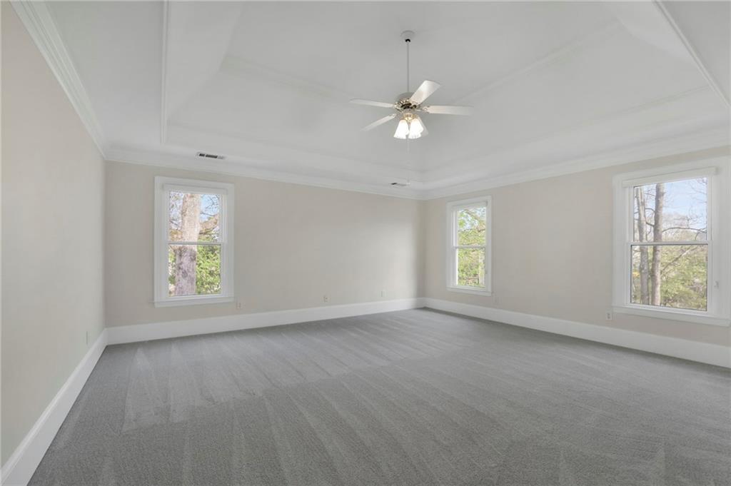 2430 Stonevalley Lane Cumming, GA 30041 - Photo 34 of 45 an empty room with windows