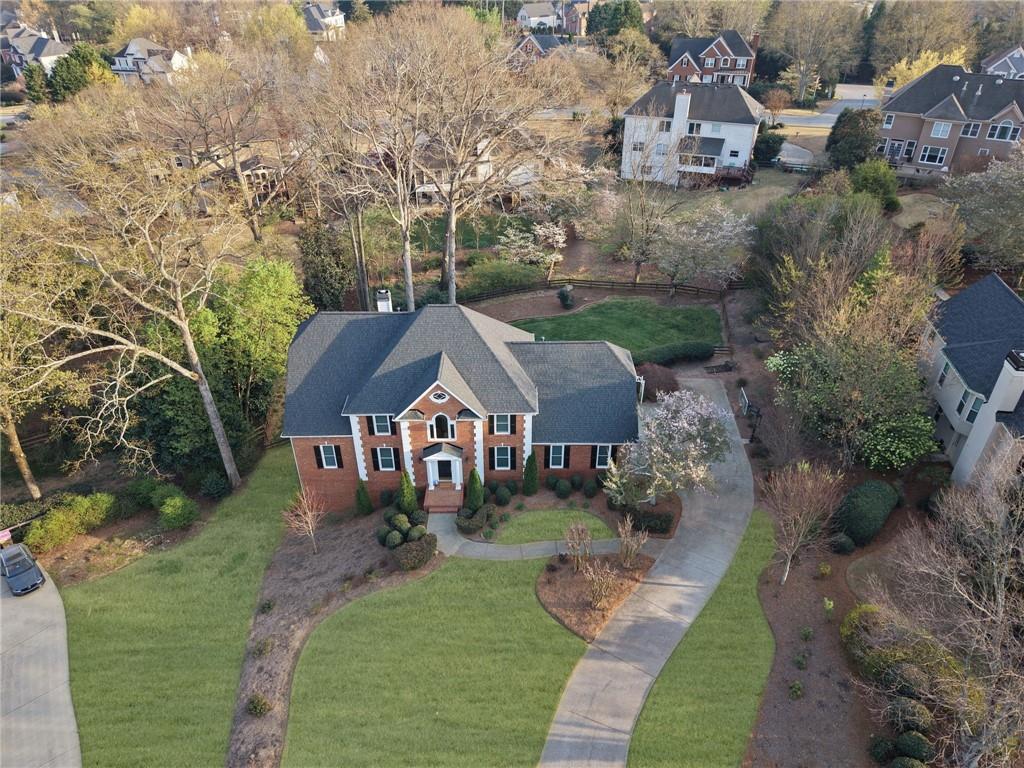 2430 Stonevalley Lane Cumming, GA 30041 - Photo 5 of 45 an aerial view of a house with a yard