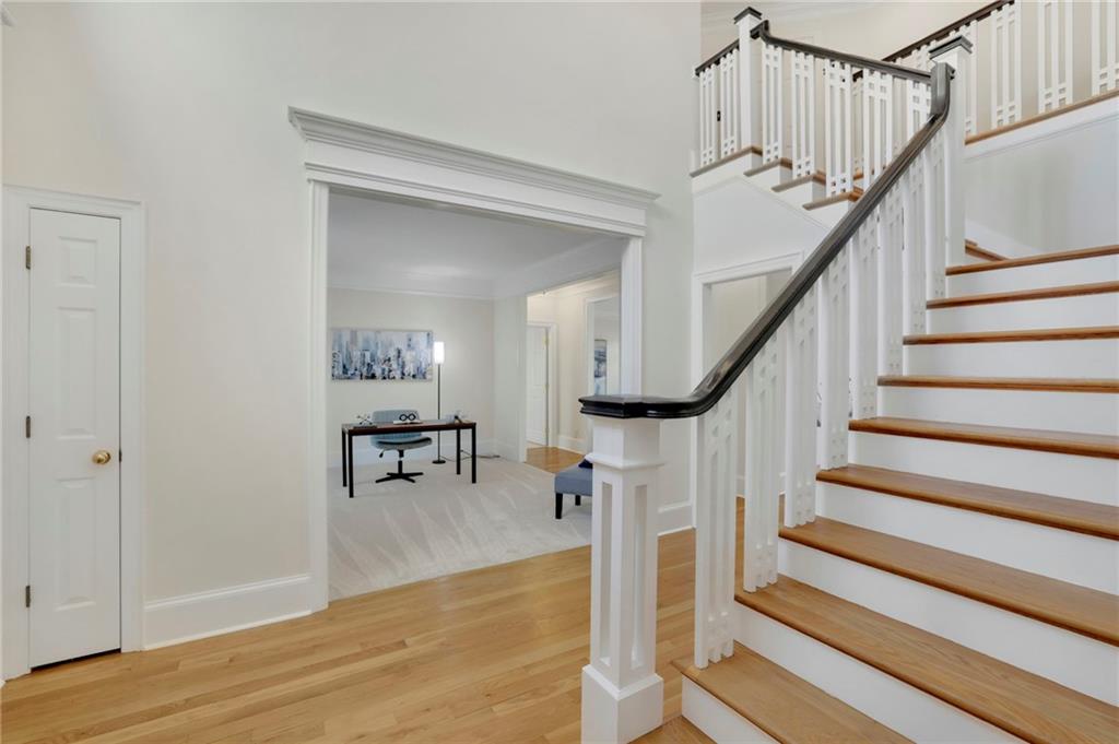 2430 Stonevalley Lane Cumming, GA 30041 - Photo 10 of 45 a view of entryway and hall with wooden floor