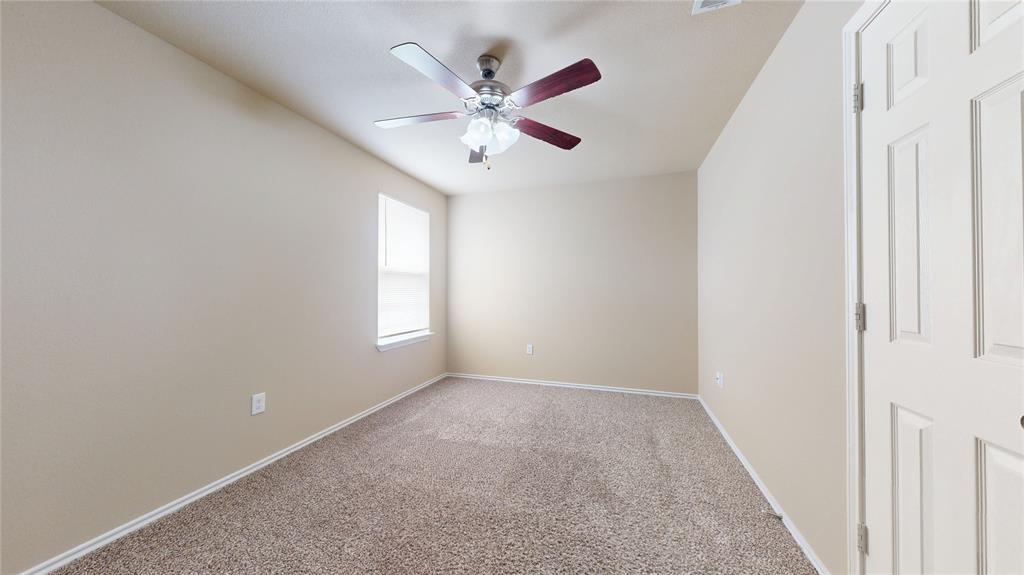 812 Parkplace Ridge Princeton, TX 75407 - Photo 14 of 17 Spare room with carpet floors and ceiling fan