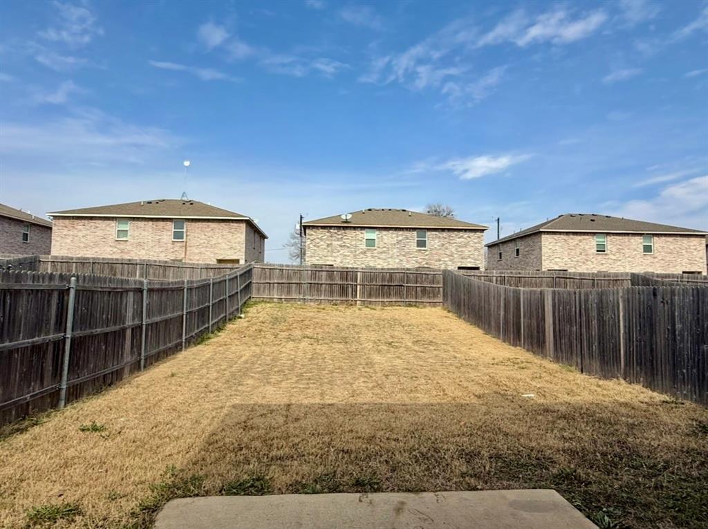 812 Parkplace Ridge Princeton, TX 75407 - Photo 17 of 17 Fenced backyard featuring a residential view