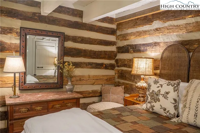 a bathroom with a sink mirror toilet and shower