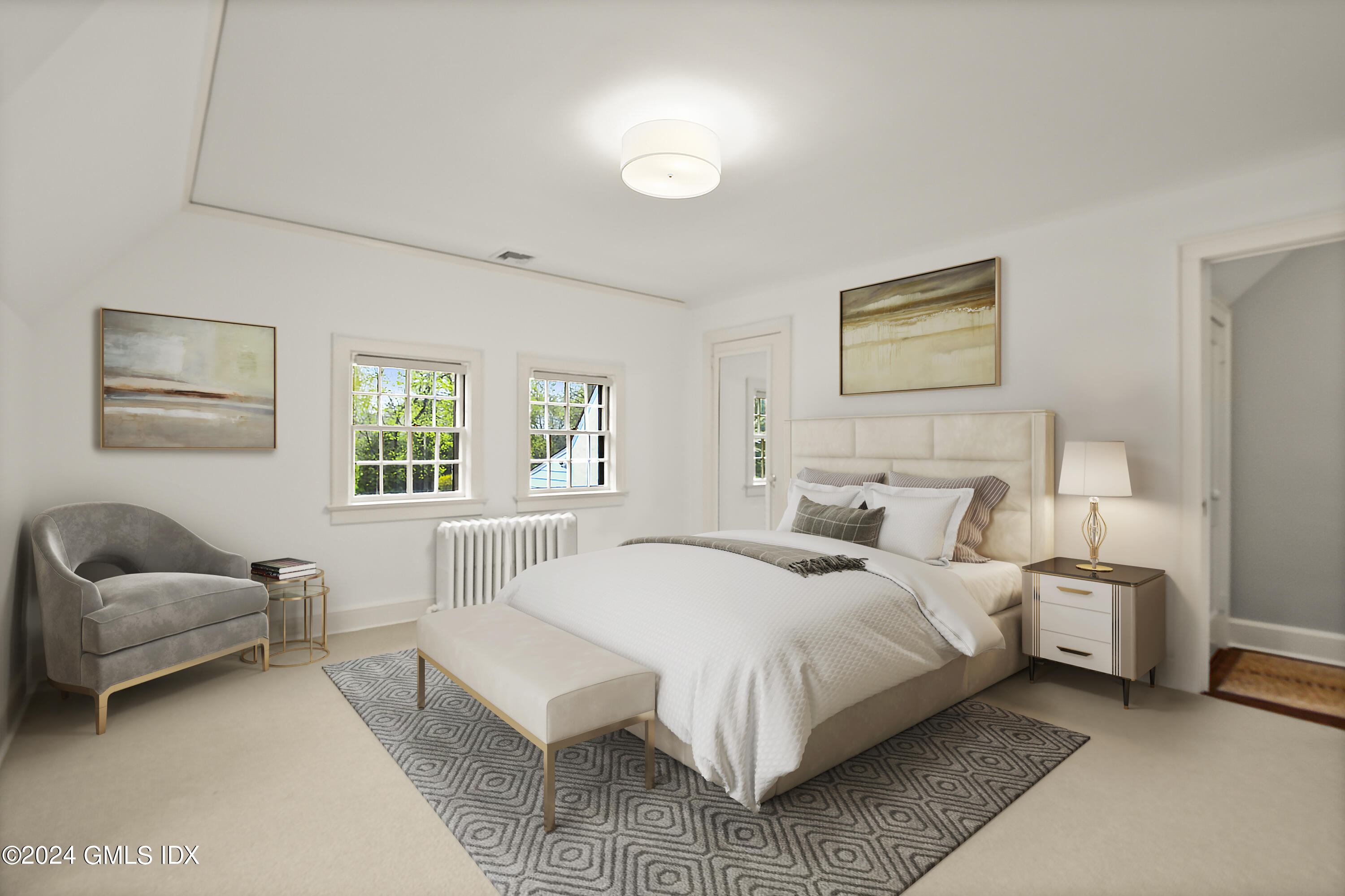 528 Field Point Road Greenwich, CT 06830 - Photo 16 of 31 a bedroom with a bed and a couch