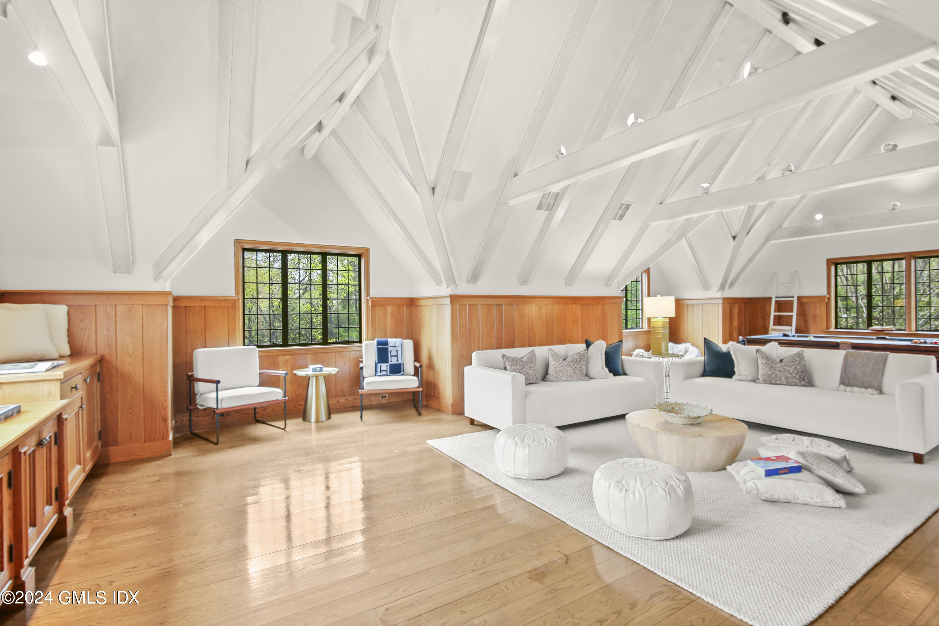 528 Field Point Road Greenwich, CT 06830 - Photo 19 of 31 a living room with furniture and a large window