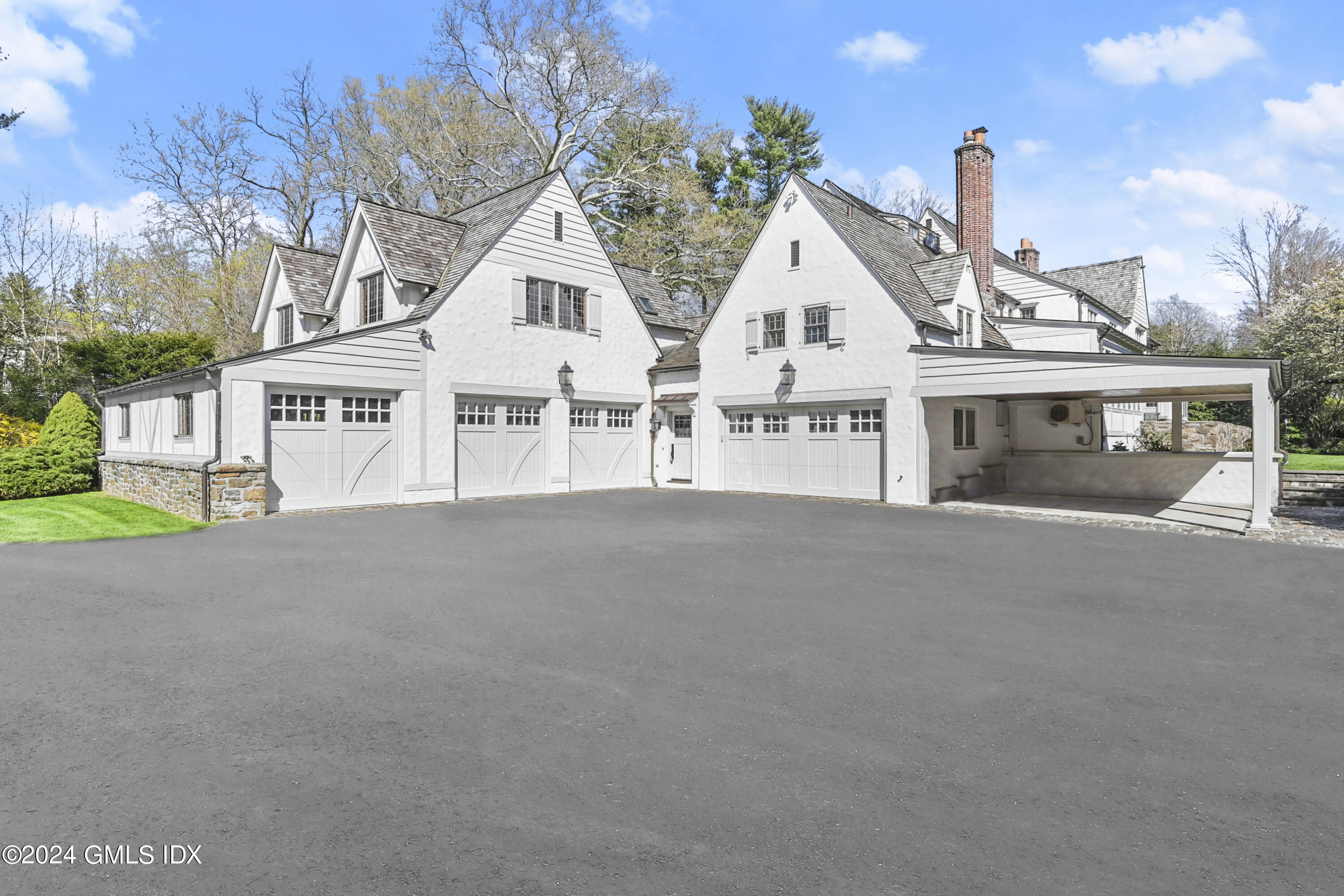 528 Field Point Road Greenwich, CT 06830 - Photo 26 of 31 a view of house with a street