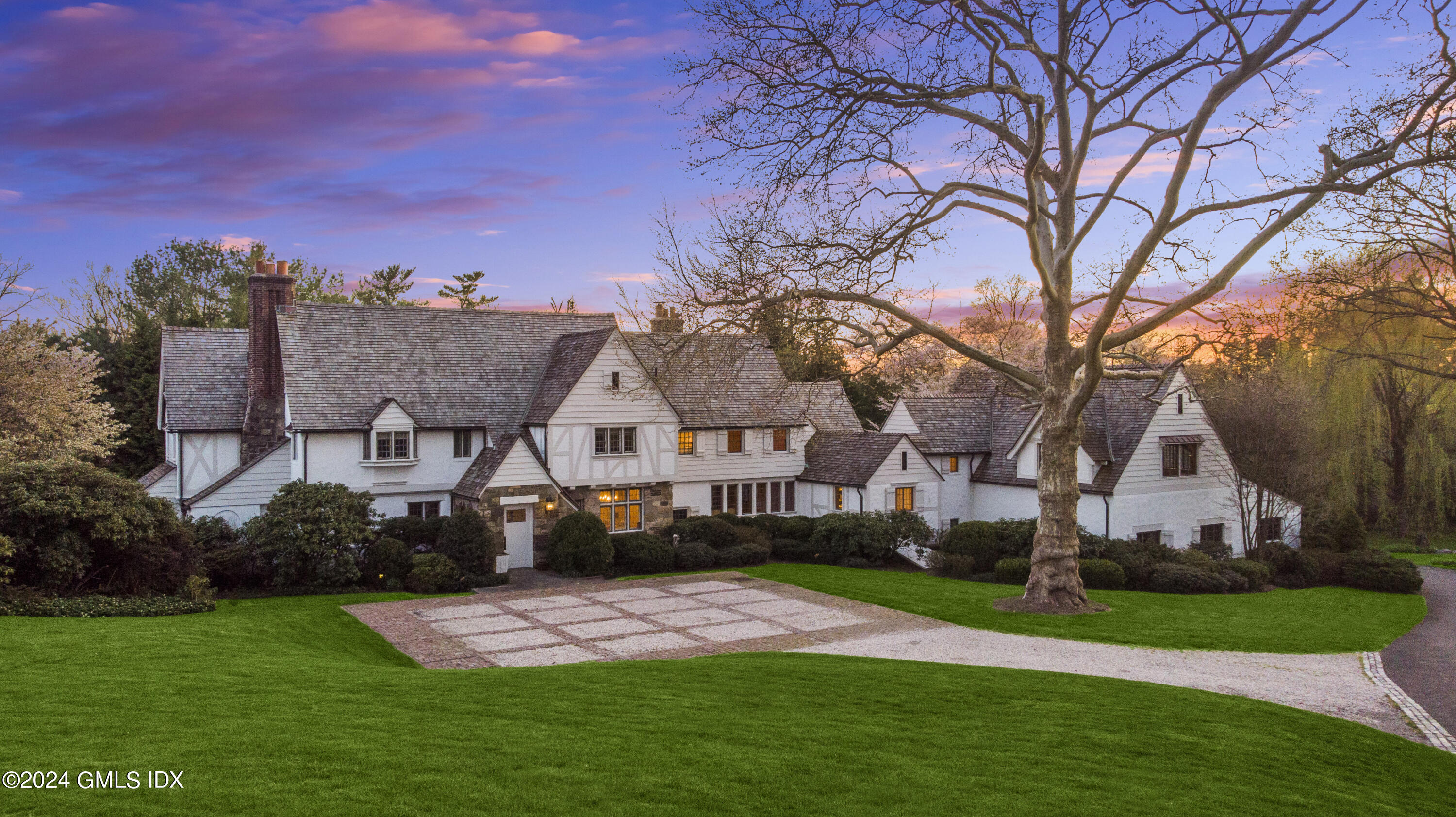528 Field Point Road Greenwich, CT 06830 - Photo 27 of 31 a view of house with a big yard