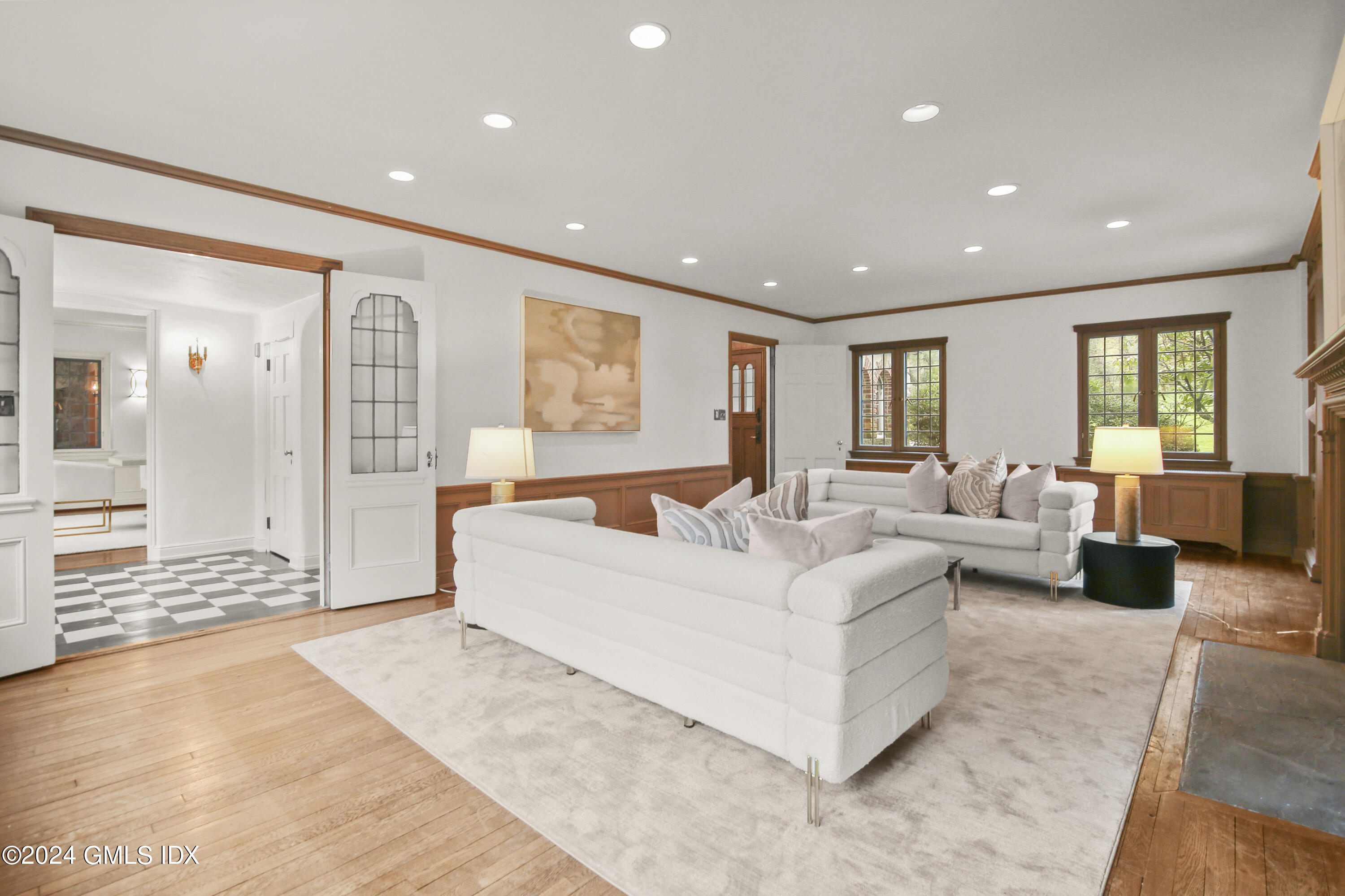 528 Field Point Road Greenwich, CT 06830 - Photo 3 of 31 a living room with furniture and a large window