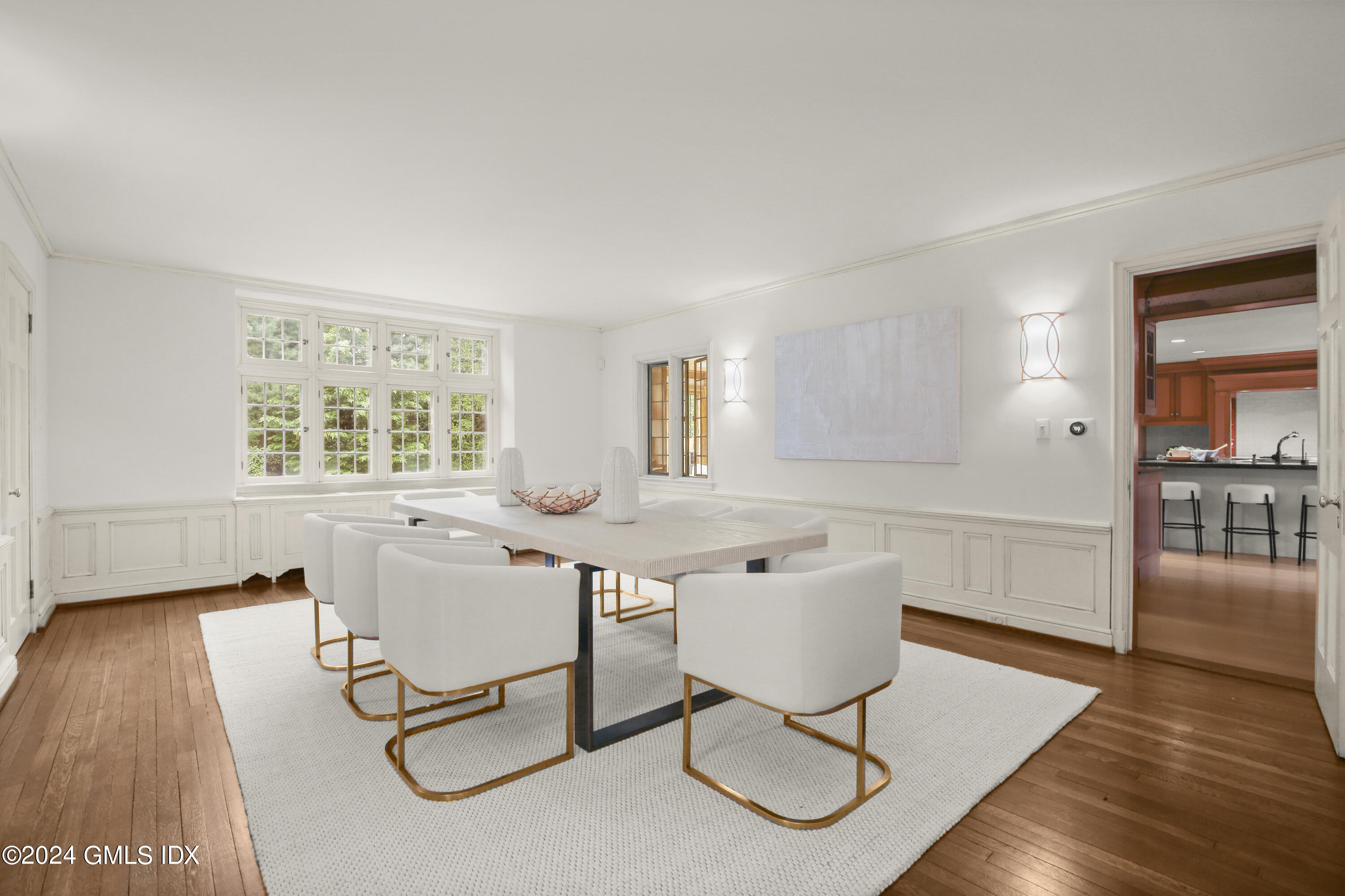 528 Field Point Road Greenwich, CT 06830 - Photo 5 of 31 a workspace with furniture window and wooden floor