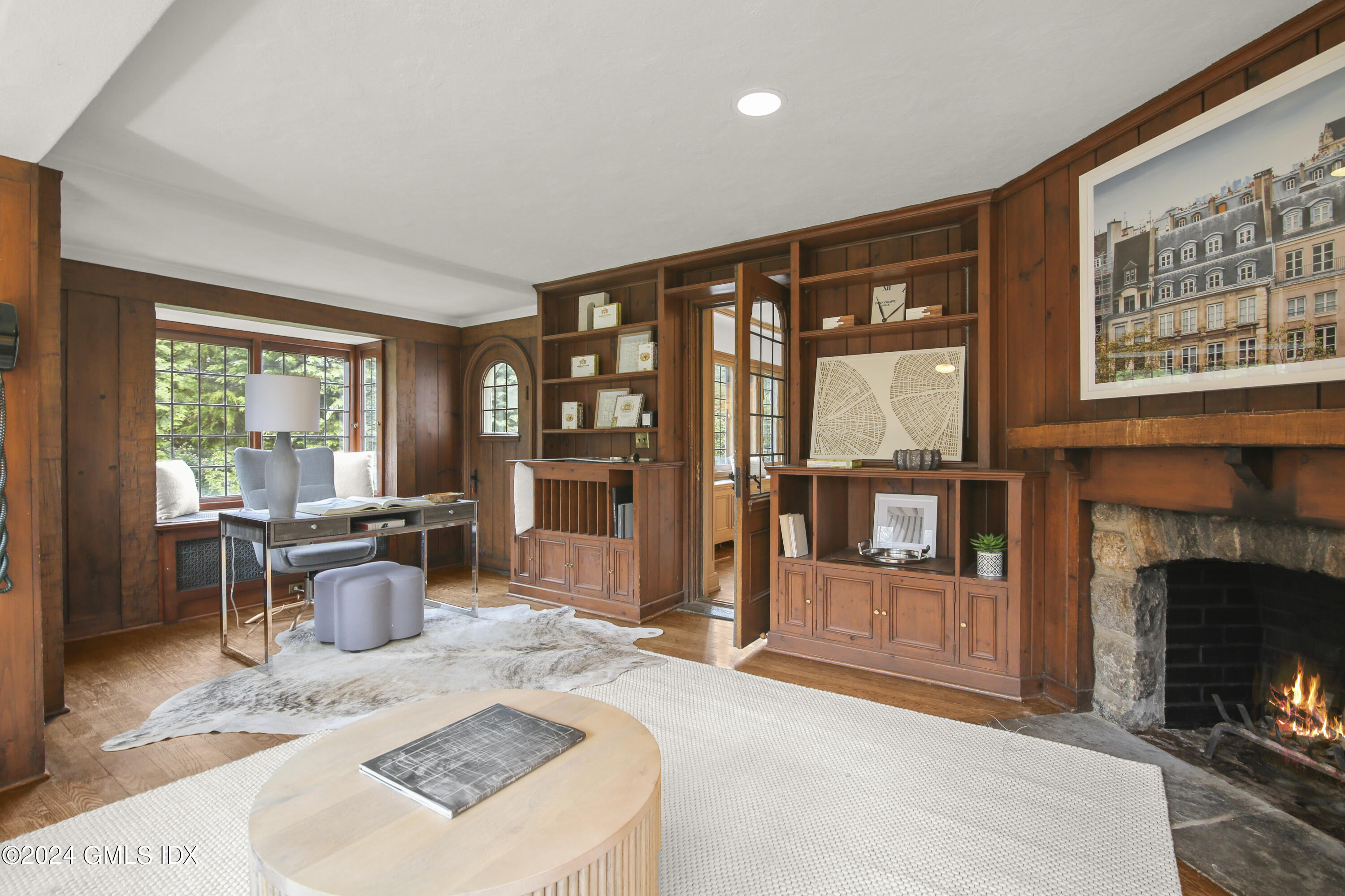 528 Field Point Road Greenwich, CT 06830 - Photo 8 of 31 a living room with furniture a window and a fireplace
