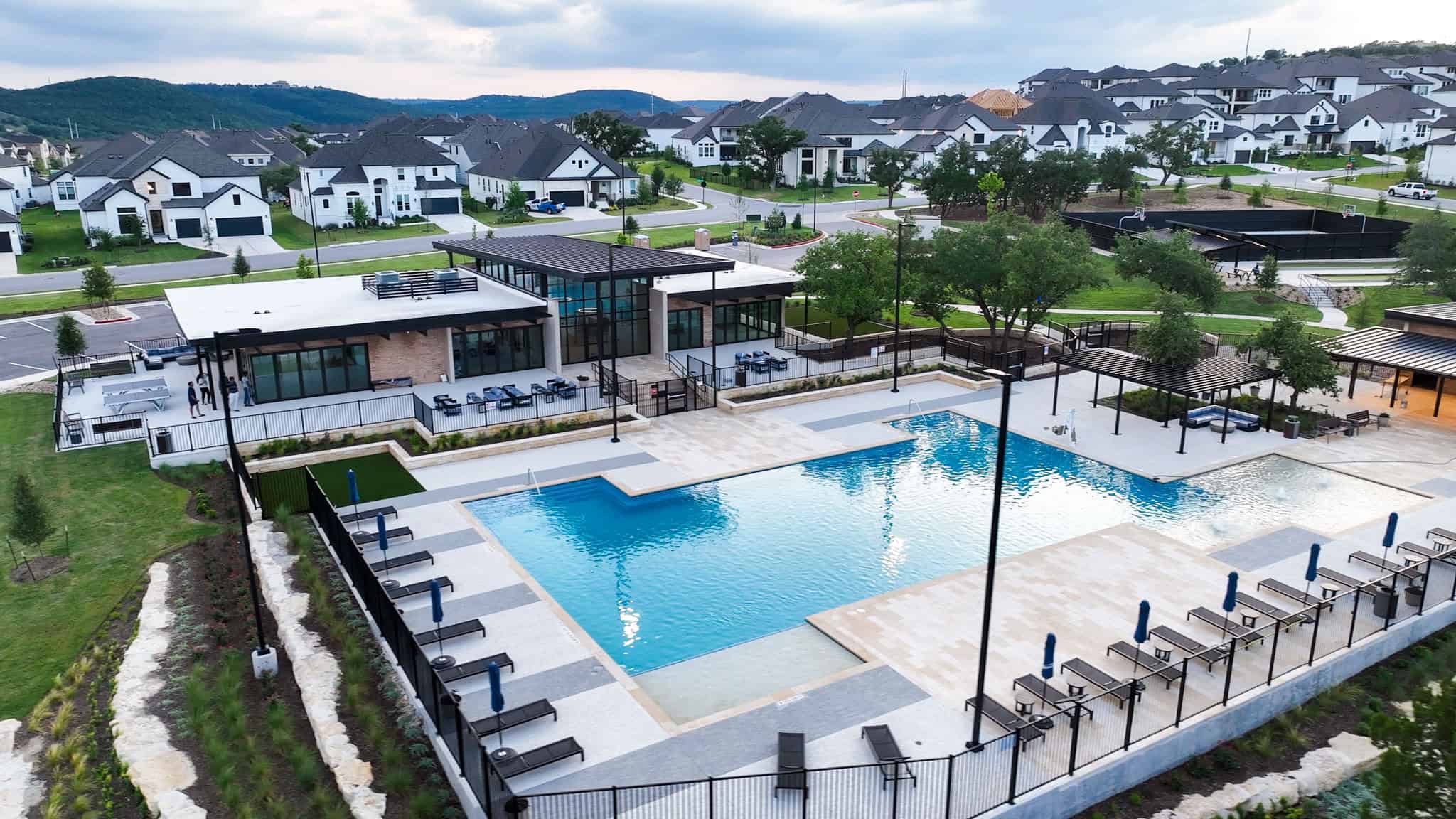 1904 Varese Path Leander, TX 78641 - Photo 30 of 37 Vibrant community with a modern clubhouse and inviting swimming pools.