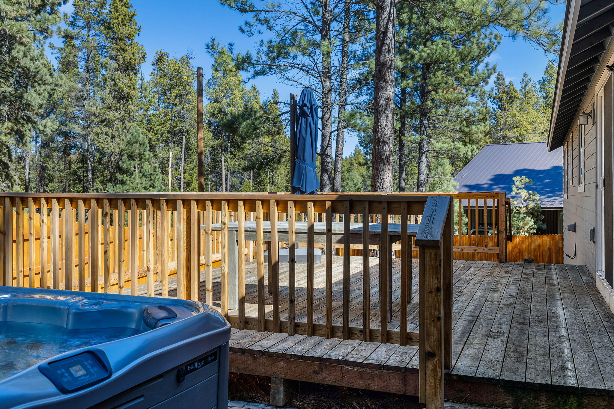 17064 Sacramento Road Bend, OR 97707 - Photo 37 of 50 a view of a patio with a table and chairs