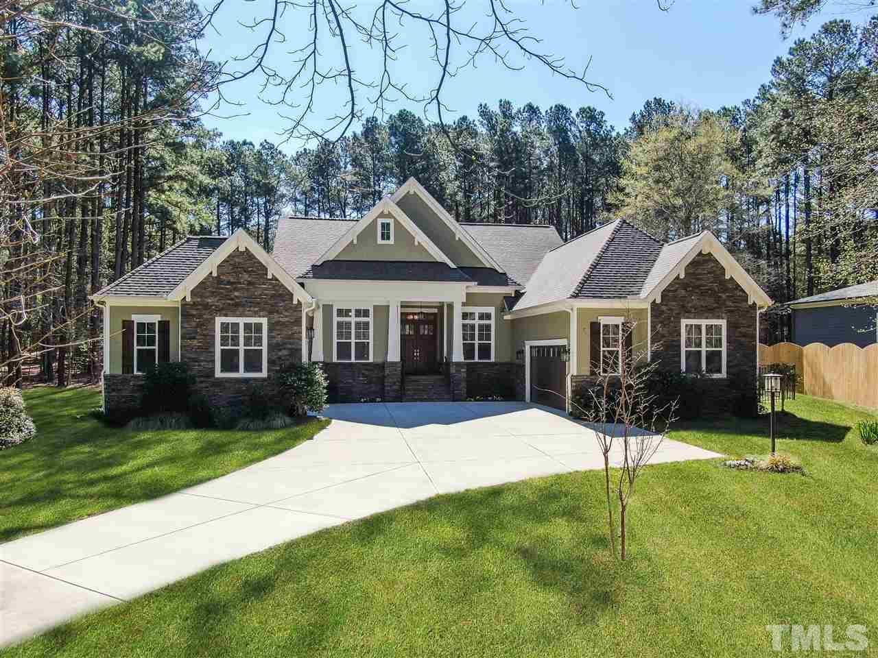 1504 Brassfield Road Raleigh, NC 27614 - Photo 1 of 30 a front view of a house with a yard