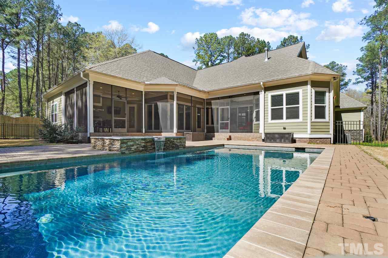 1504 Brassfield Road Raleigh, NC 27614 - Photo 2 of 30 a swimming pool with outdoor seating and yard