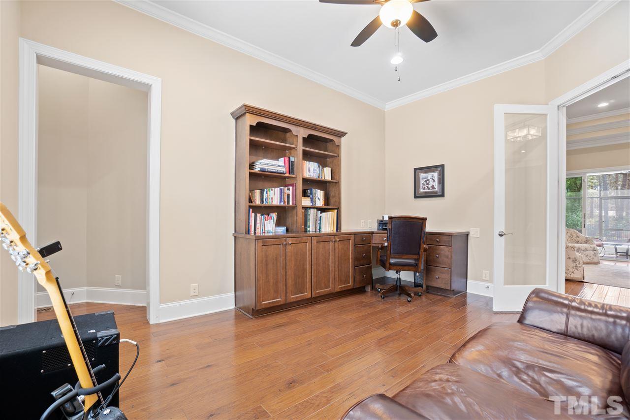 1504 Brassfield Road Raleigh, NC 27614 - Photo 12 of 30 a bedroom with a workspace