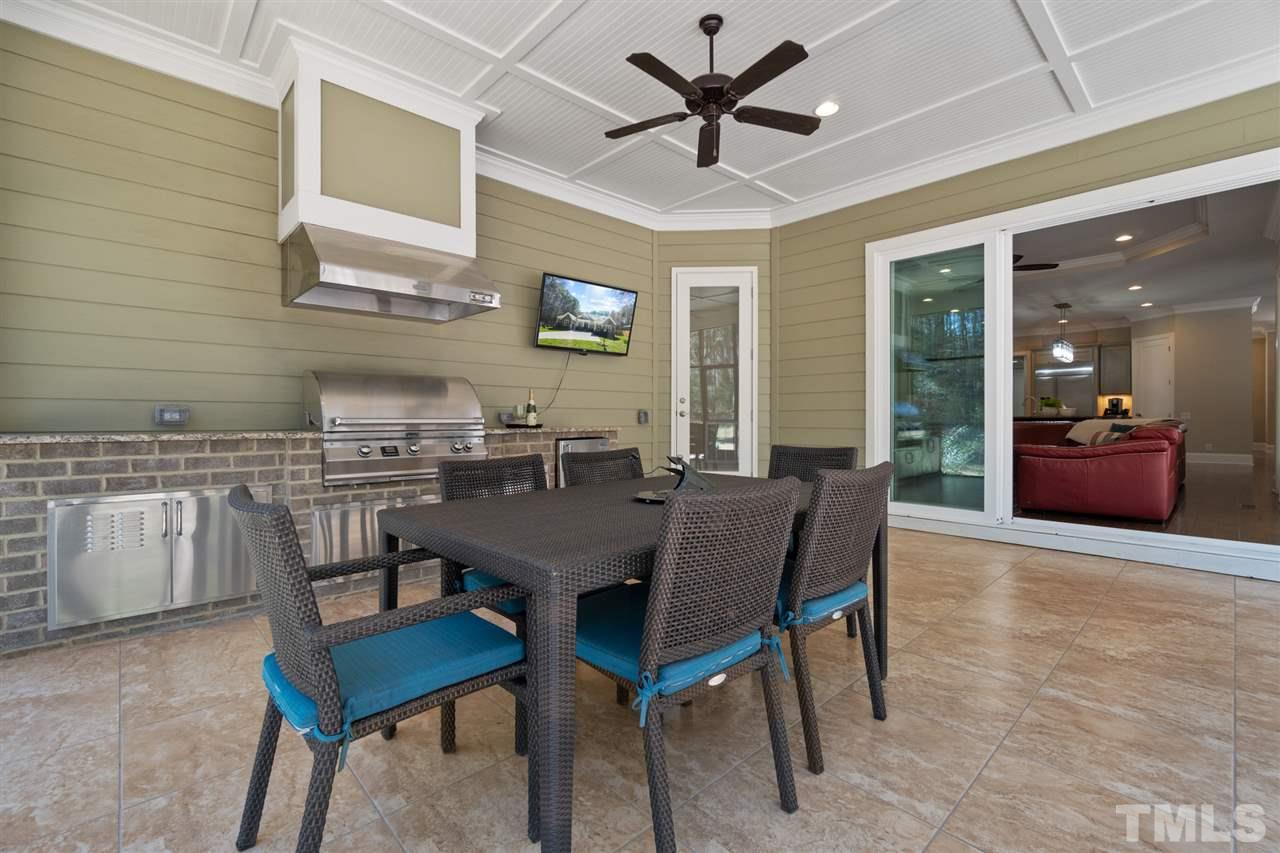 1504 Brassfield Road Raleigh, NC 27614 - Photo 27 of 30 a view of a dining room with furniture