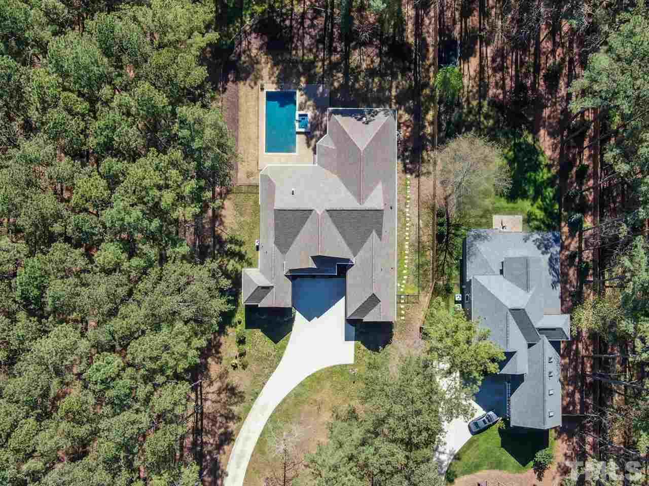1504 Brassfield Road Raleigh, NC 27614 - Photo 29 of 30 an aerial view of a house with yard and garage