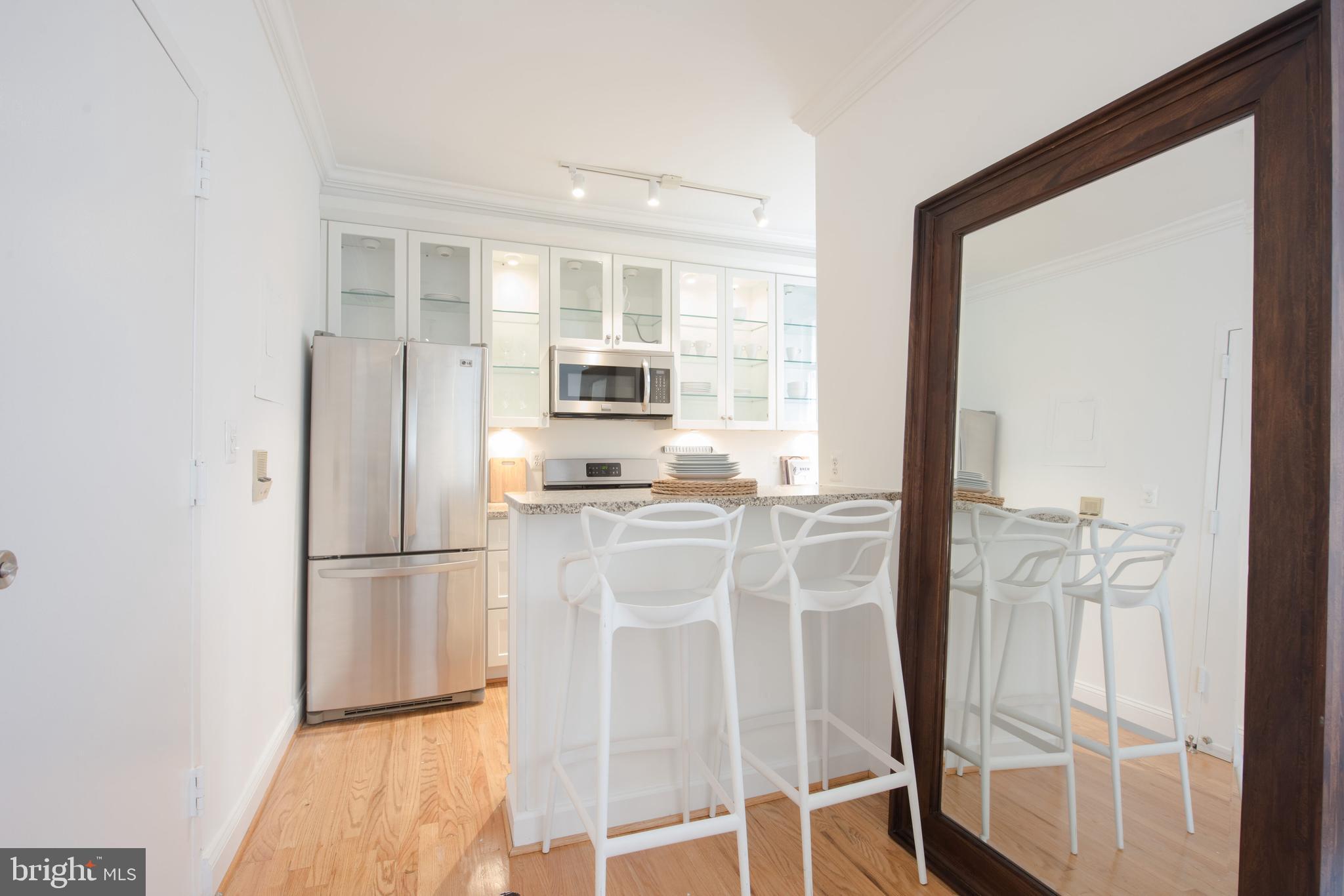1828 Riggs Place Northwest, Unit 6 Washington, DC 20009 - Photo 5 of 23 Updated kitchen with stainless steel appliances