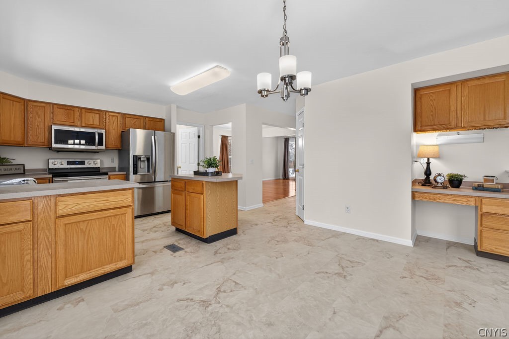 4848 Yenny Road Onondaga, NY 13215 - Photo 13 of 50 Eat in area of kitchen, with island and separate d