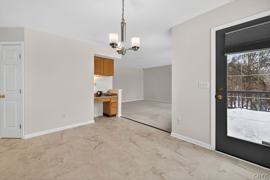 4848 Yenny Road Onondaga, NY 13215 - Photo 20 of 50 Eat in area with door that leads to a nice size de
