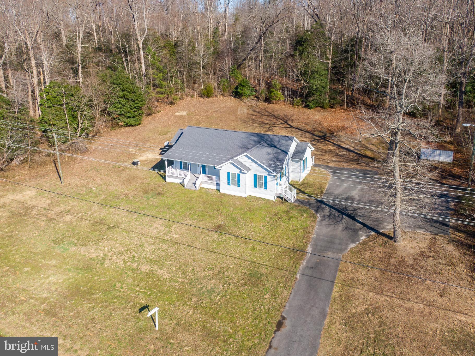8589 River Road Lancaster, VA 22503 - Photo 35 of 49 a view of swimming pool with an outdoor space