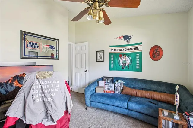 a bedroom with furniture and a bed