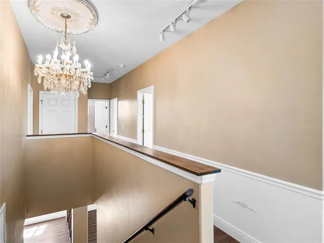 an aerial view of house with yard